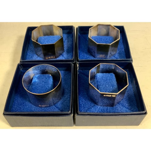 309 - A set of three silver octagonal napkin rings, quite plain, Elkington & Co, Sheffield, 1992, 1994, 19... 