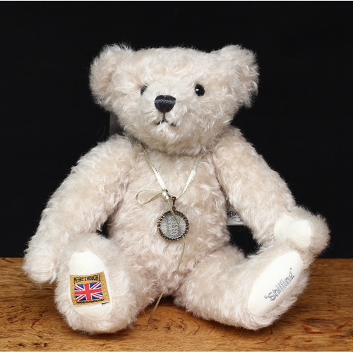 129 - A Merrythought SH12SHIL Shilling teddy bear, made exclusively for Compton and Woodhouse, trademark y... 