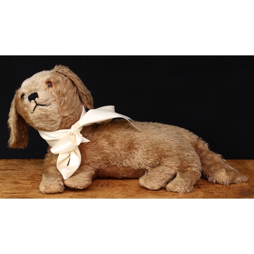 132 - A 1930’s brown and cream mohair Dog, straw filled head with brown and black glass eyes, black vertic... 