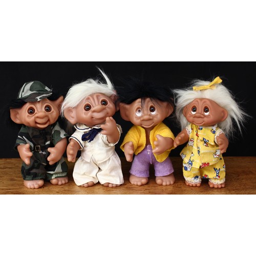 139 - A Thomas Dam Troll doll, wearing an all camouflage uniform with matching cap and black belt, inset b... 