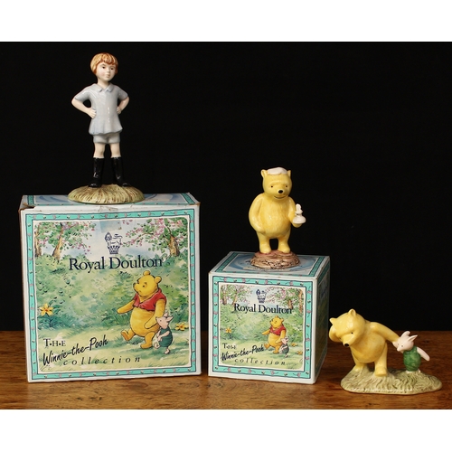 141 - Royal Doulton The Winnie The Pooh Collection, comprising WP9 Christopher Robin, boxed; WP2 Pooh and ... 