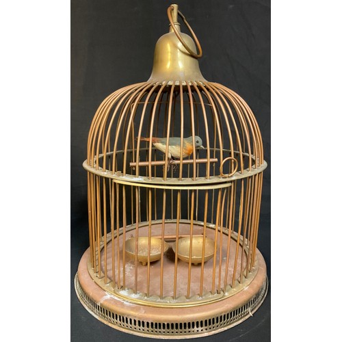 157 - A brass and copper bird cage, 44cm high