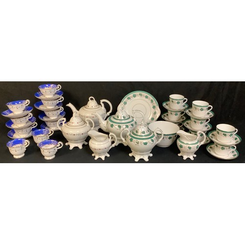 159 - A late 19th century teapot, sucrier and cream jug, decorated with stylised flowers, c.1870;  another... 