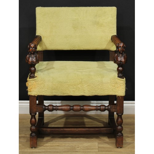 113 - A Jacobean Revival oak open armchair, spirally-turned arms, the arm posts carved as female herms, tu... 