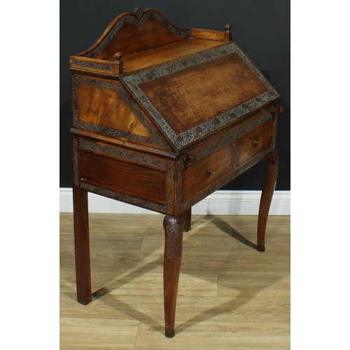 114 - An Anglo-Indian design bureau, three-quarter gallery above a fall front enclosing four small drawers... 