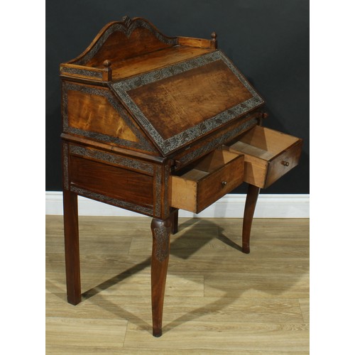 114 - An Anglo-Indian design bureau, three-quarter gallery above a fall front enclosing four small drawers... 