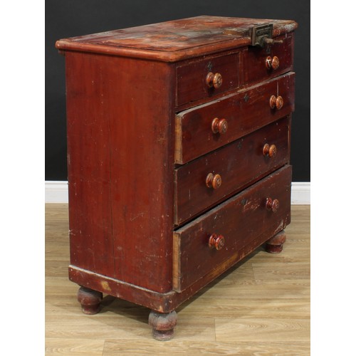 645 - A Victorian mahogany chest, rectangular top anachronistically fitted with a vise, above two short an... 