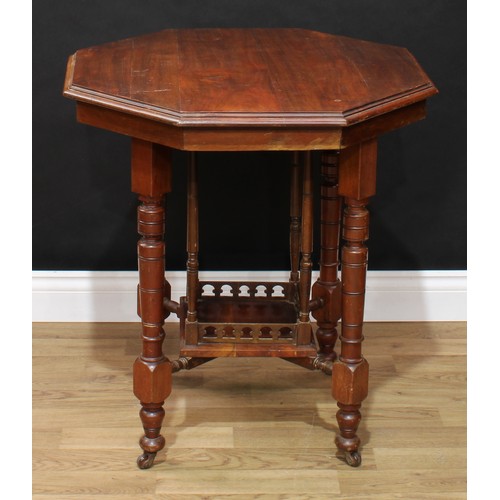 648 - An early 20th century mahogany octagonal centre table; a retro mid 20th century bentwood bar chair (... 