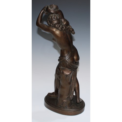 24 - A 19th century brown patinated library sculpture, Baccante and Infant Faun, oval base, 45.5cm high, ... 