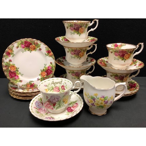 68 - A Royal Albert Old Country Roses set of five cups and six saucers, six tea plates; a Sweet Pea patte... 