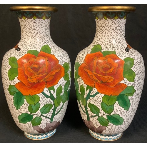 81 - A pair of Chinese cloisonné vases, decorated with roses and butterfly, 20cm high