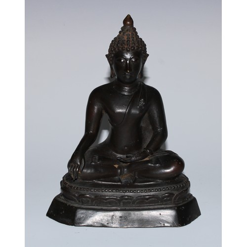 82 - A Burmese bronze Buddha, seated in meditation, 20.5cm high