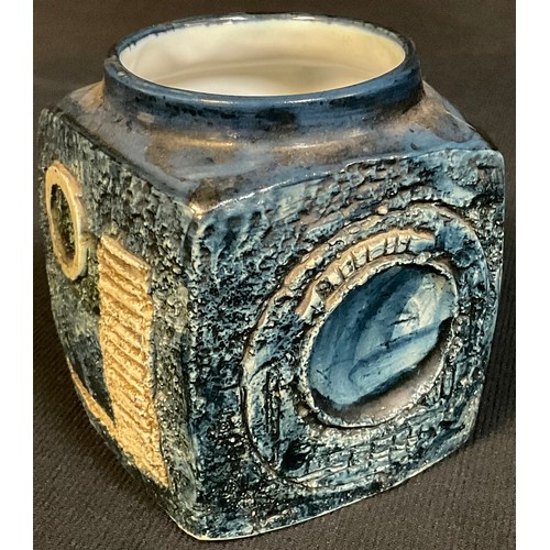 121 - A Troika cube shaped marmalade pot, glazed in shades of blue, 9cm high