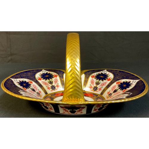 1 - A Royal Crown Derby Imari palette 1128 pattern basket, the handle painted in solid gold, 28.5cm wide... 