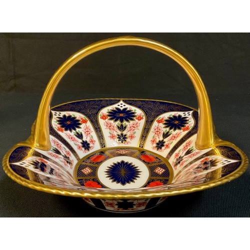 1 - A Royal Crown Derby Imari palette 1128 pattern basket, the handle painted in solid gold, 28.5cm wide... 