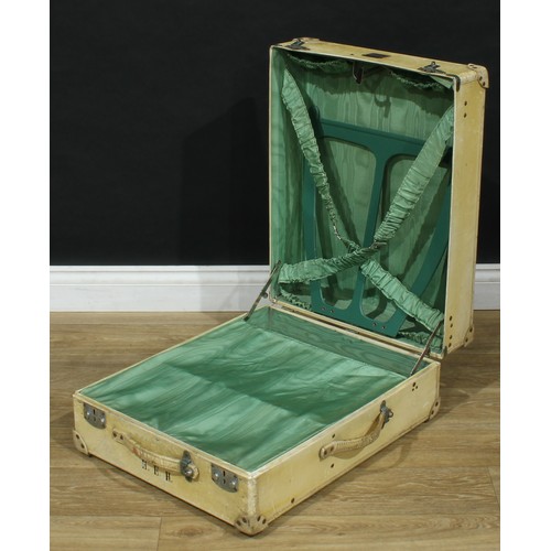 676 - A cream steamer trunk folding wardrobe, The Taycall, retailed by Manson, Swan and Morean LTD, monogr... 