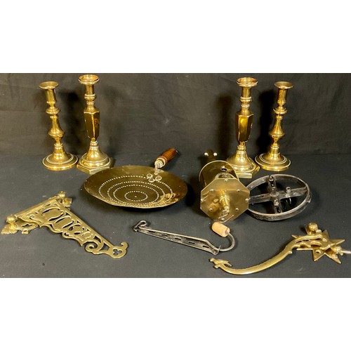 679 - A 19th century meat jack; a brass skillet; a pair of ejector candlesticks; a Boer War brass bracket ... 