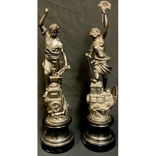 692 - A pair of spelter figures, Industrie, made in England, reg.no. 777168, turned wooden bases, 53cm