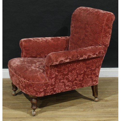 108 - An early 20th century armchair, stuffed-over upholstery, scroll arms, 93cm high, 84cm wide, the seat... 