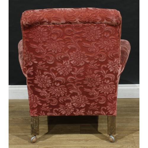 108 - An early 20th century armchair, stuffed-over upholstery, scroll arms, 93cm high, 84cm wide, the seat... 