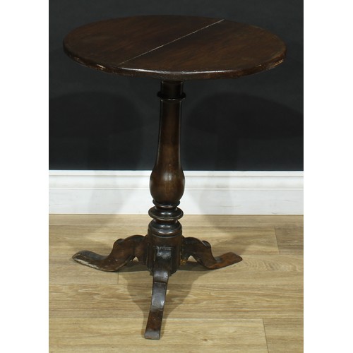 714 - An oak tripod occasional table, 60cm high, 50cm diameter