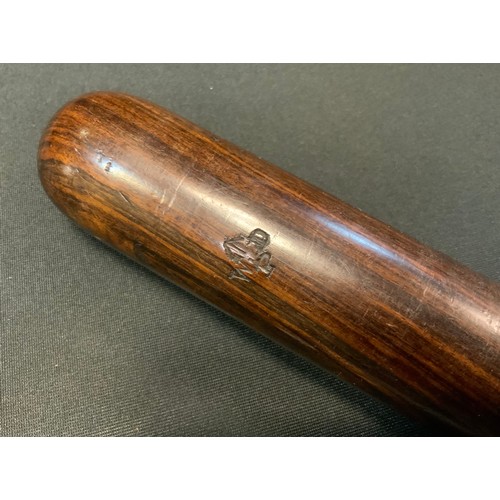 121 - A Military issue Police truncheon, W D P and broad Arrow issue marks, serial No 586, 40cm long;  a J... 