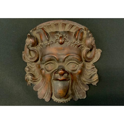 123 - A 19th century carved Gothic wall mask, grotesque horned face, tongue out, 16.5cm x 16.5cm;  a Kings... 