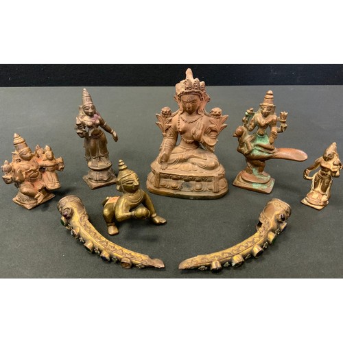 124 - A Tibetan terracotta temple figure, possibly Maitreya, seated on a Lotus pad, 10cm tall;  Indian bro... 