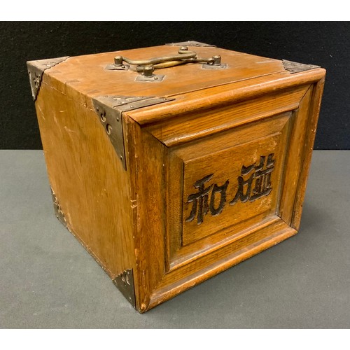 128 - A Chinese Mah-Jong set, boxwood tiles, the oak cabinet with five drawers, measuring 18.5cm x 21.5cm ... 