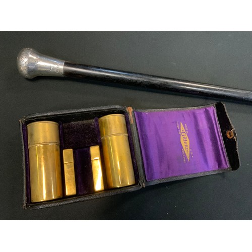 131 - A Victorian silver topped knop handle ebony walking cane, London; a travelling shaving kit