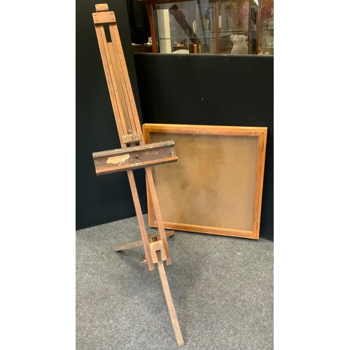 158 - A wall mounted glazed display case, 84cm x 82cm;  a large floor standing  easel  (2)