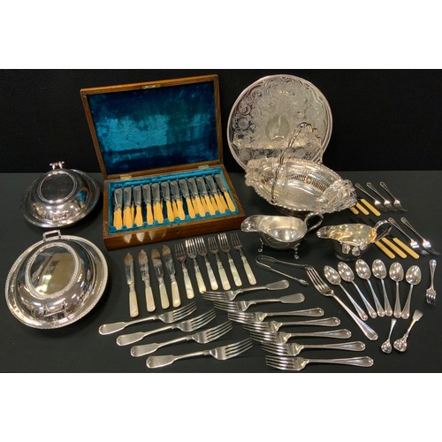 169 - A Silver plated fish service for twelve,  carved handles;  two oval entree dishes;  Victorian Swing ... 