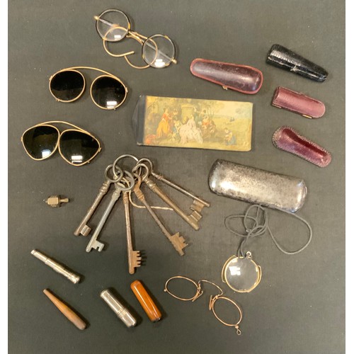 133 - Early 20th century glasses;  old keys;  charoot holders; etc