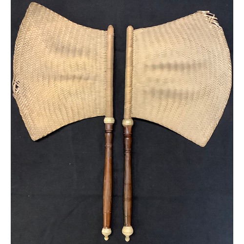 94 - A pair of Chinese hardwood and rattan hand banners, 19th/early 20th century