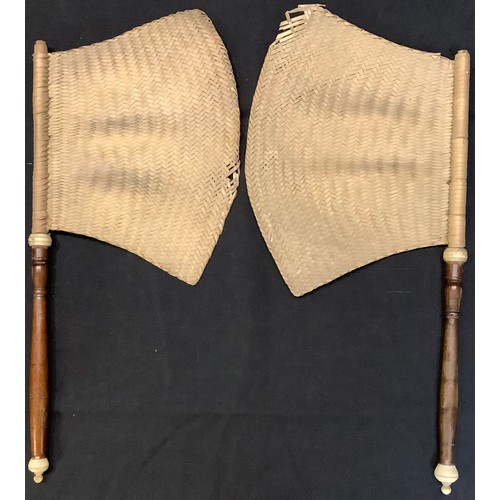 94 - A pair of Chinese hardwood and rattan hand banners, 19th/early 20th century