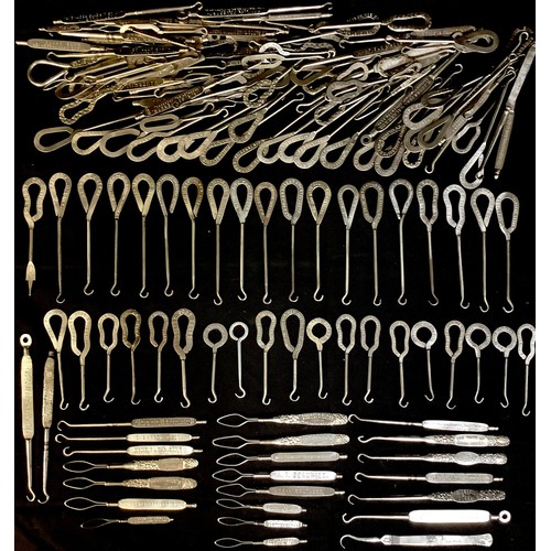 95 - Advertising - a collection of late 19th/early 20th century button hooks, mostly advertising a differ... 
