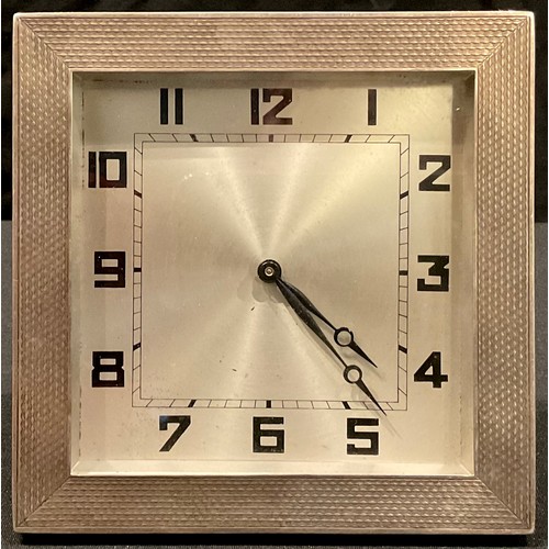 97 - An Art Deco silver easel clock, Birmingham 1931