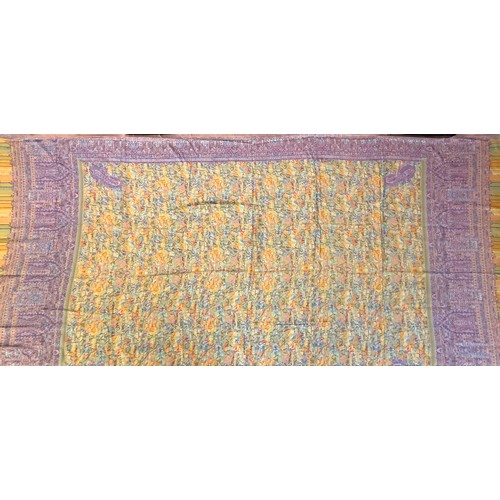 98 - Textiles - a silk and wool Paisley shawl, in shades of red, green and blue on a yellow ground, 100cm... 