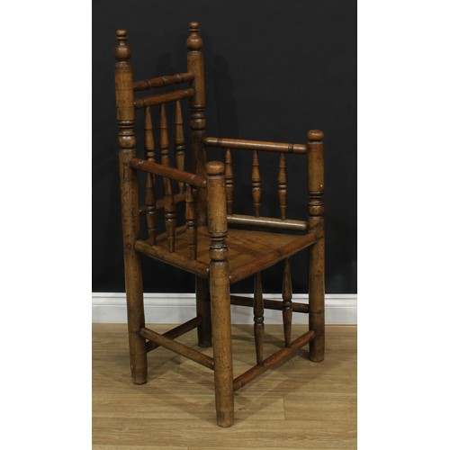 4 - A 17th century style turner's chair, 109.5cm high, 62.5cm wide, the seat 42cm wide and 38cm deep