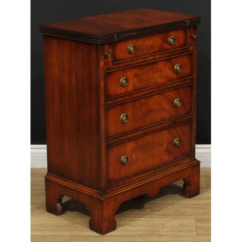 108 - A Queen Anne style bachelor's chest, fold-over top above four long graduated drawers, skirted base, ... 