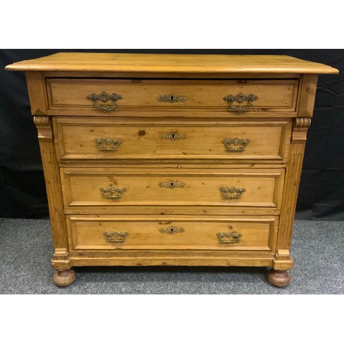 48 - A country house pine chest of drawers, oversailing rectangular top, above four long drawers, brass h... 