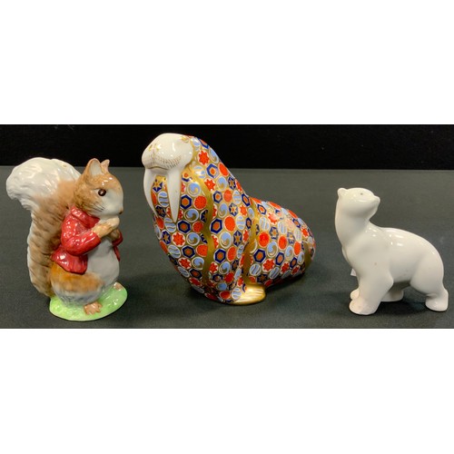 81 - A Beswick Beatrix Potter figure Timmy Tiptoes, gold base stamp;  Nao Polar bear Cub;  A Royal Crown ... 