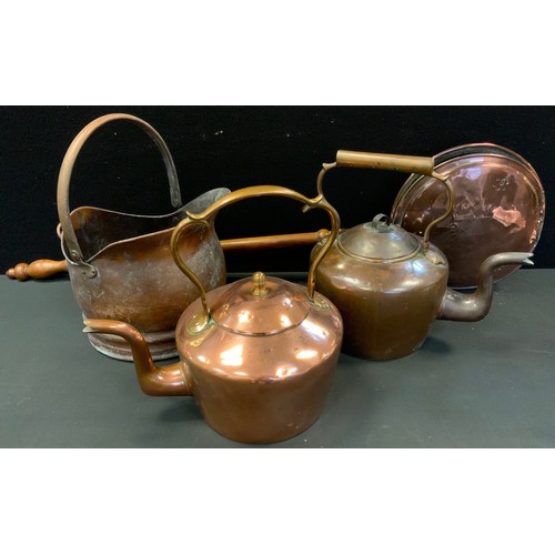 226 - A Victorian copper kettle, c.1880;  another'  a warming pan;  a copper coal scuttle, (4)