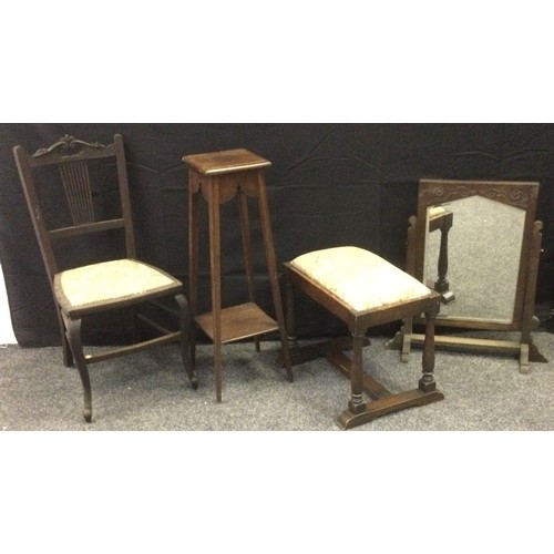 229 - A 20th century mahogany side chair; a late 20th century mahogany plant stand; an oak stool; a oak dr... 