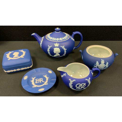 264 - A Wedgwood cobalt blue King George VI coronation three piece tea set, impressed marks;  Queen Elizab... 