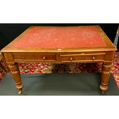 150 - A late 19th century mahogany library table, the frieze with a pair of drawers, the verso conforming,... 