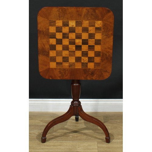 6 - A 19th century walnut, rosewood and mahogany games table, rounded rectangular tilting top inlaid for... 