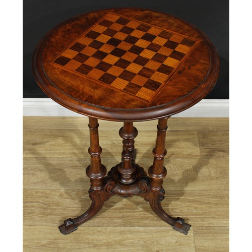 8 - A Victorian walnut, rosewood, oak and mahogany games table, circular top inlaid for chess, turned co... 