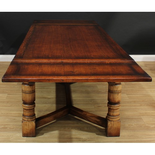 18 - A Titchmarsh & Goodwin oak draw-leaf refectory dining table, rectangular top, turned and blocked sup... 