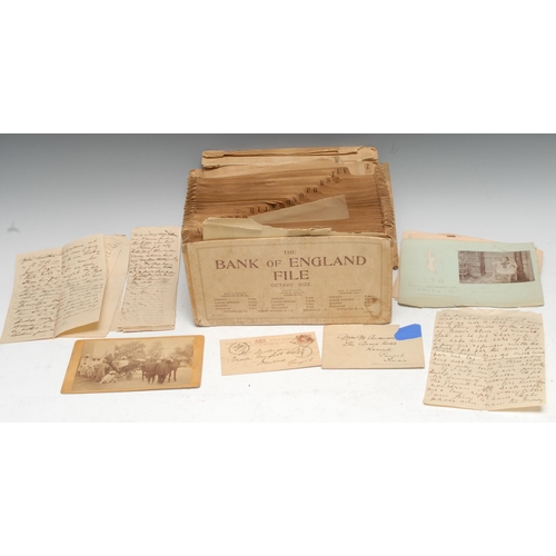 343 - East India, a bundle of a family's ephemera, comprising photographs, letters, and post, including a ... 